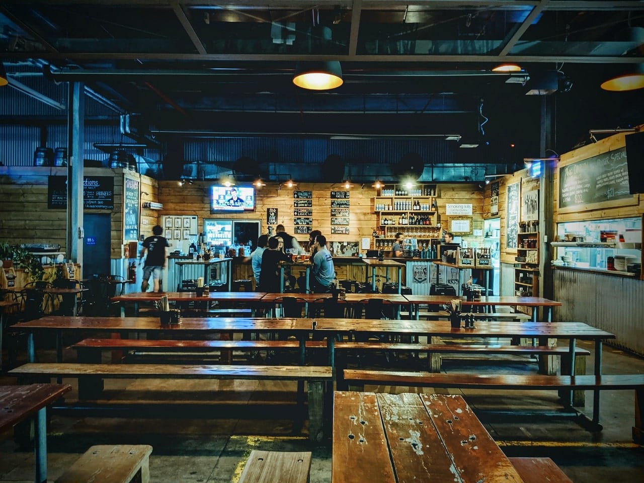 customers dine at an open area diner in 160 bourke road, alexandria, australia