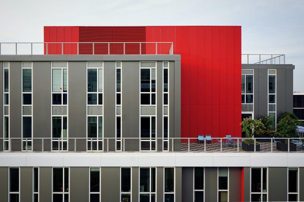 grey and red modern apartment building