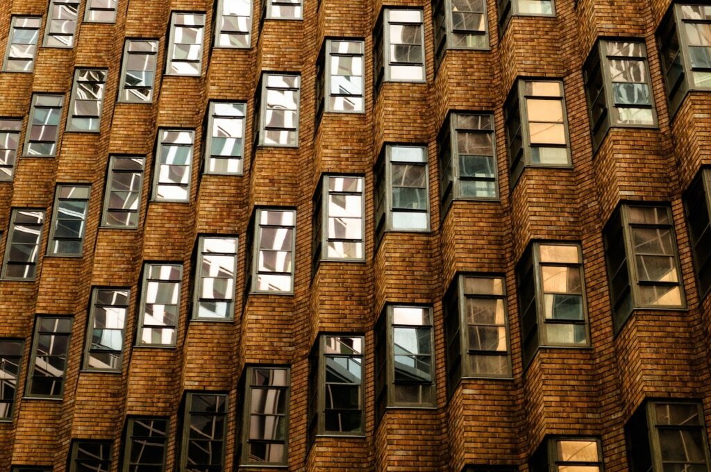 apartment building made of old brown brick blocks