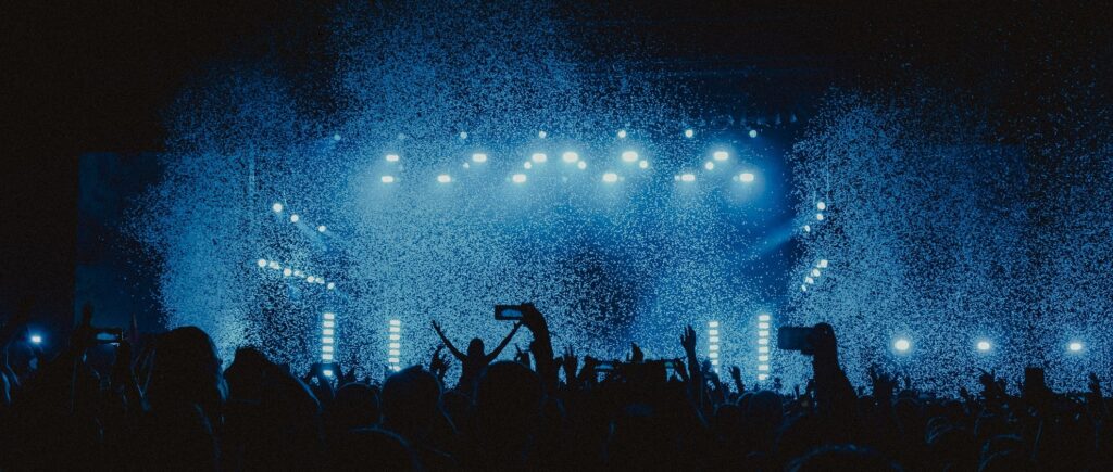 a white confetti shower at a concert