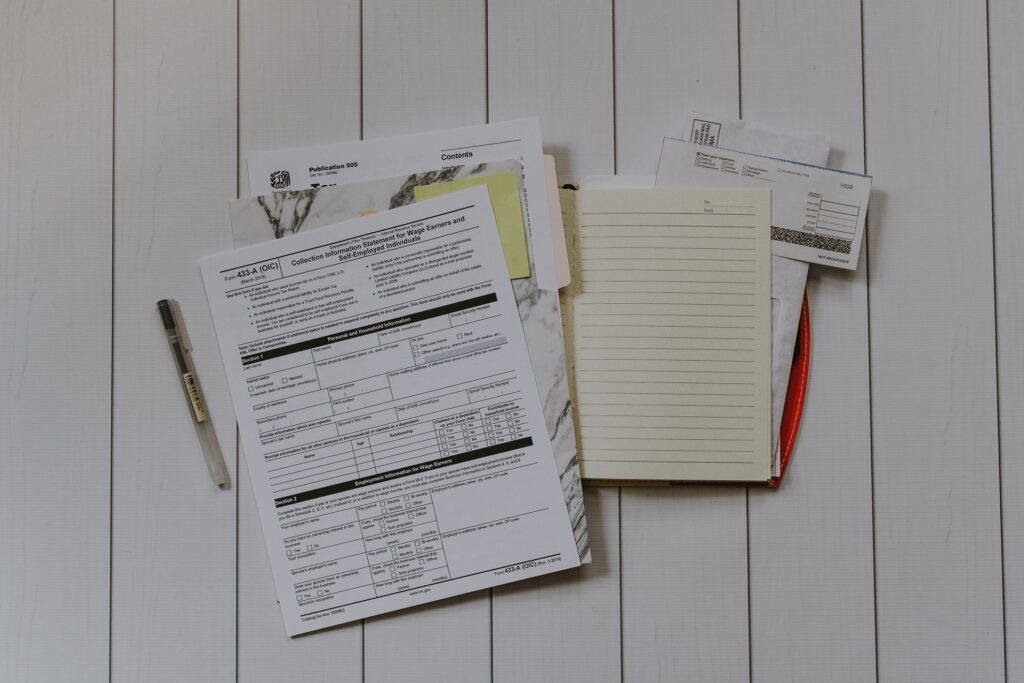 A stack of tax forms and other documents.