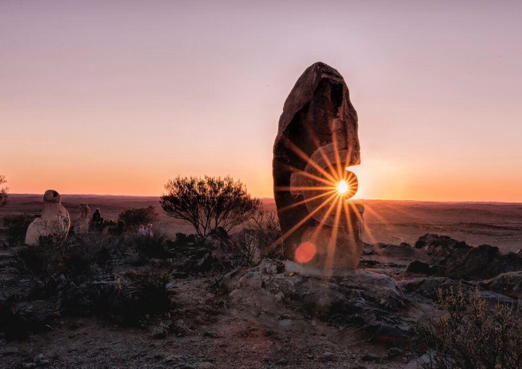 sunburst over the living desert sculptures in broken hill, australia