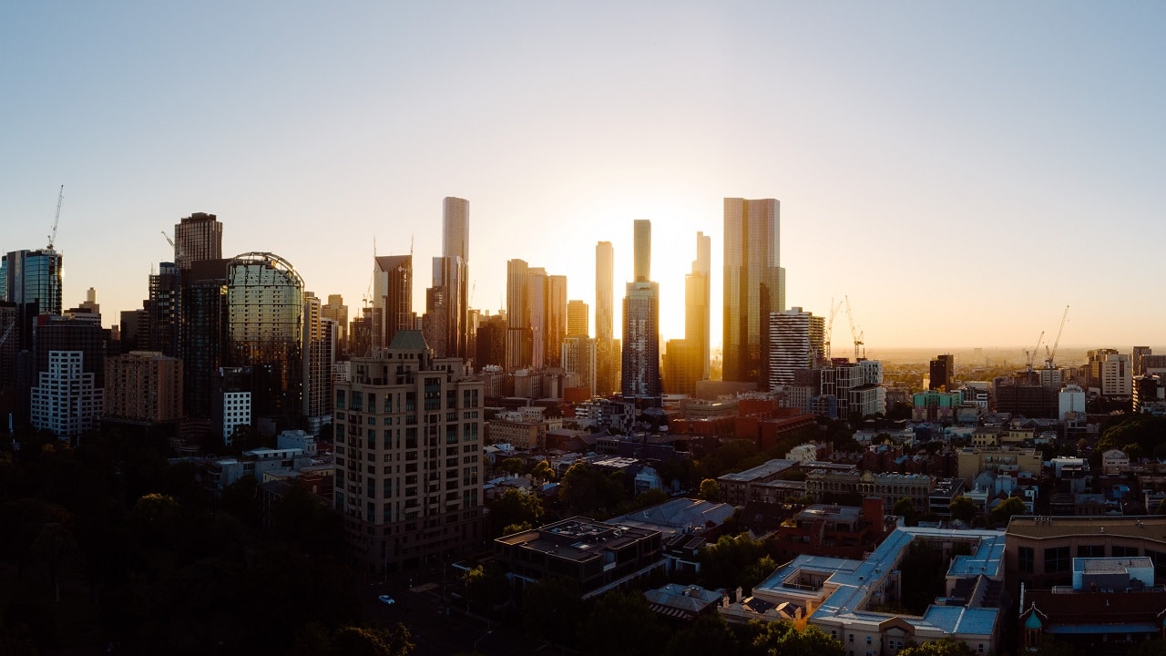 the melbourne skyline at sunrise