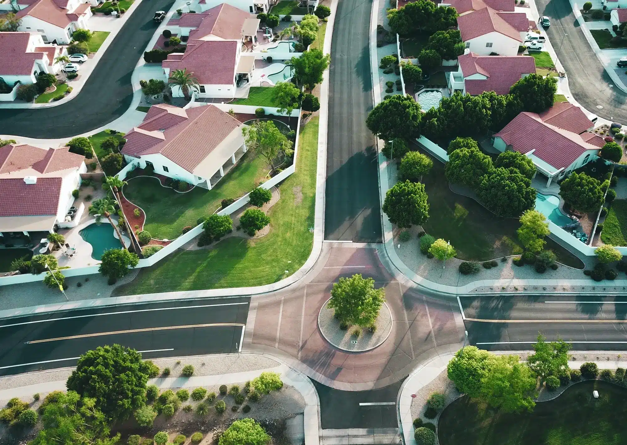 An eagle's eyeview of a roundabout within a suburb, representing the concept of testamentary trust.